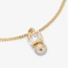 Brățară Jc Pearl Cube Brățară din metal auriu cu perle și cuburi de cristal Brățară Jc Pearl Cube Brățară din metal auriu cu perle și cuburi de cristal