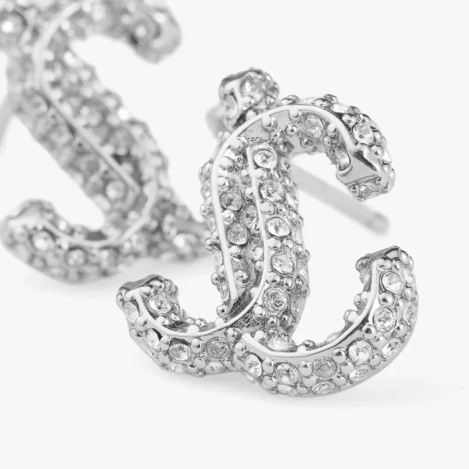 Cercei Jc Studs Cercei Jc Studs din metal cu finisaj argintiu și cristale Swarovski