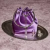 Geantă de mână Bon Bon din satin violet orhidee cu mâner metalic Geantă de mână Bon Bon din satin violet orhidee cu mâner metalic