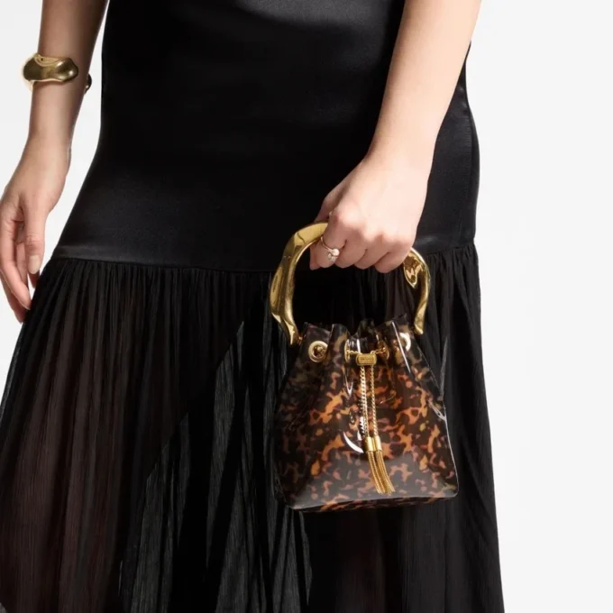 Geantă tip sac Bon Bon transparentă, cu model de broască țestoasă și mâner sculptat Geantă tip sac Bon Bon transparentă, cu model de broască țestoasă și mâner sculptat