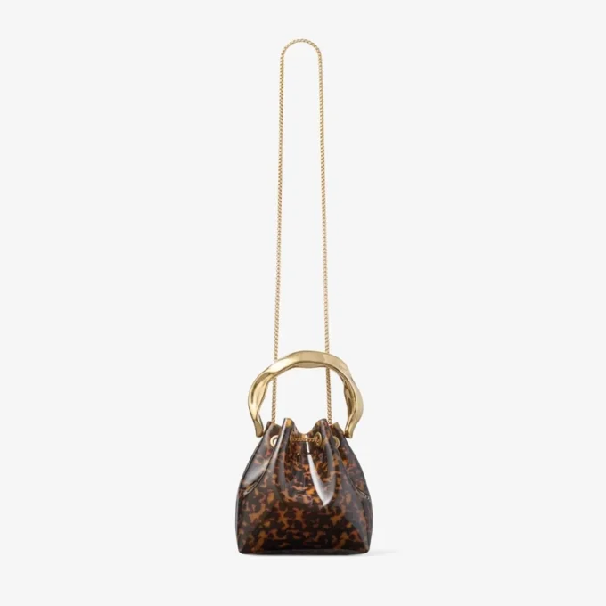 Geantă tip sac Bon Bon transparentă, cu model de broască țestoasă și mâner sculptat Geantă tip sac Bon Bon transparentă, cu model de broască țestoasă și mâner sculptat