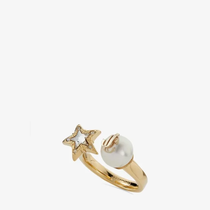 Inel Jc Star Pearl Inel din metal cu finisaj auriu, cu stea de cristal și perlă Inel Jc Star Pearl Inel din metal cu finisaj auriu, cu stea de cristal și perlă