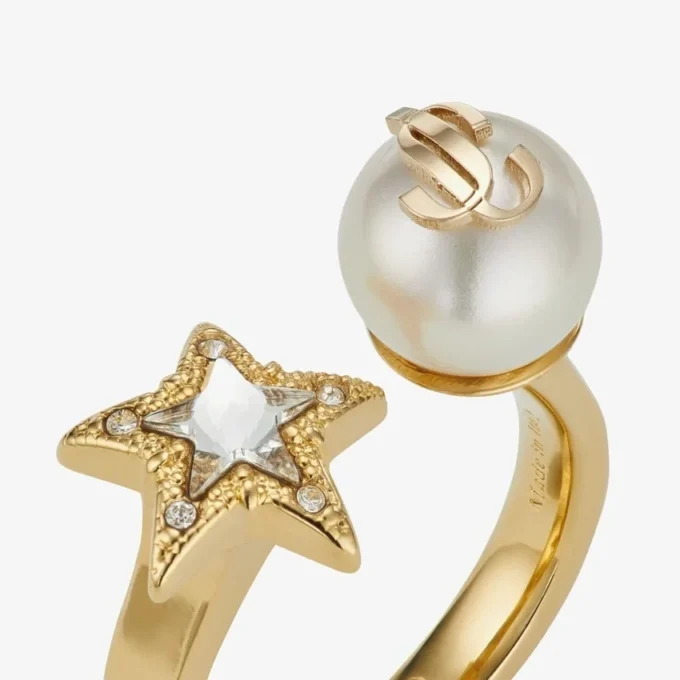 Inel Jc Star Pearl Inel din metal cu finisaj auriu, cu stea de cristal și perlă Inel Jc Star Pearl Inel din metal cu finisaj auriu, cu stea de cristal și perlă