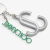 Jc Multi Charm Argintiu și verde metalic Nappa Star Logo Bag Charm Jc Multi Charm Argintiu și verde metalic Nappa Star Logo Bag Charm