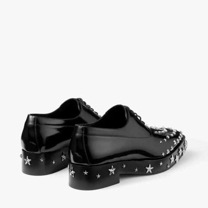 Jimmy Choo Noir Kei Ninomiya Star Încălțăminte cu șireturi din piele de vițel lustruită, negri, cu ornamente în formă de stea Jimmy Choo Noir Kei Ninomiya Star Încălțăminte cu șireturi din piele de vițel lustruită, negri, cu ornamente în formă de stea