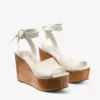 Jori 100 – Pantofi cu toc înalt din piele de vițel lucioasă de culoare latte și plută lucioasă Jori 100 – Pantofi cu toc înalt din piele de vițel lucioasă de culoare latte și plută lucioasă