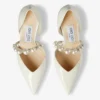 Pantofi cu vârf ascuțit Aurelie 85 din piele lăcuită de culoare latte, cu ornamente din perle Pantofi cu vârf ascuțit Aurelie 85 din piele lăcuită de culoare latte, cu ornamente din perle
