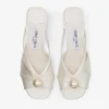 Siva Mule 50 Mule din satin de culoare ivoriu cu ornamente din perle Siva Mule 50 Mule din satin de culoare ivoriu cu ornamente din perle