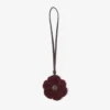 Talisman cu flori tricotate Talisman cu flori din lână tricotată de culoare merlot intens, cu finisaje din piele
